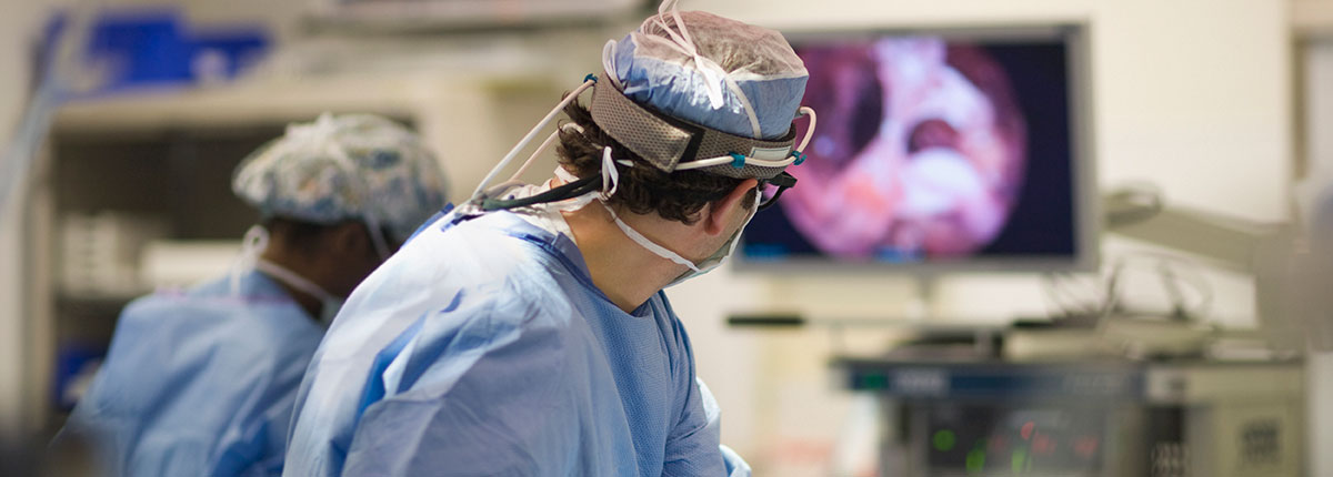 surgeon looking at operating screen